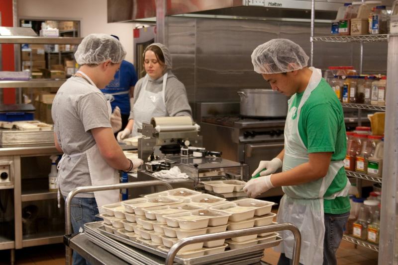 Students cooking in a kitchen